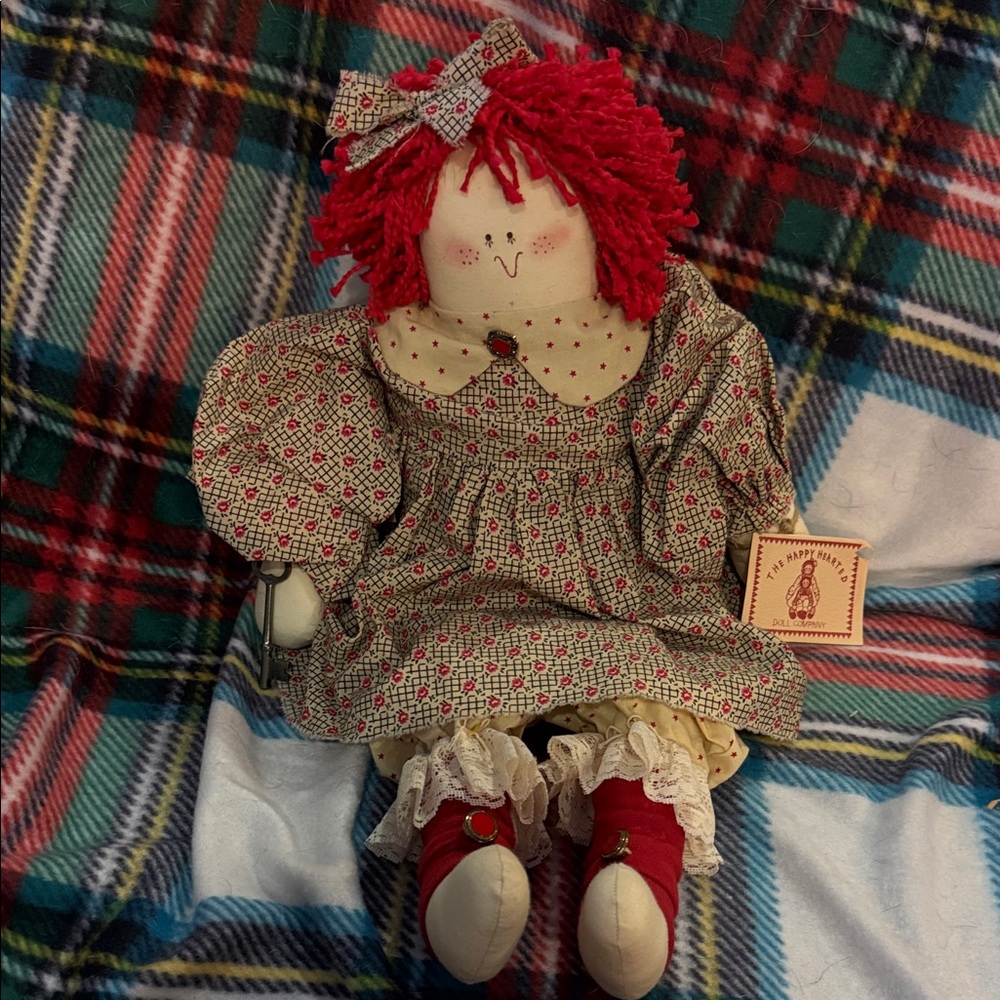 Adorable Rag Doll with Red Hair and Patterned Dress